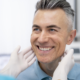 come funziona un impianto dentale
